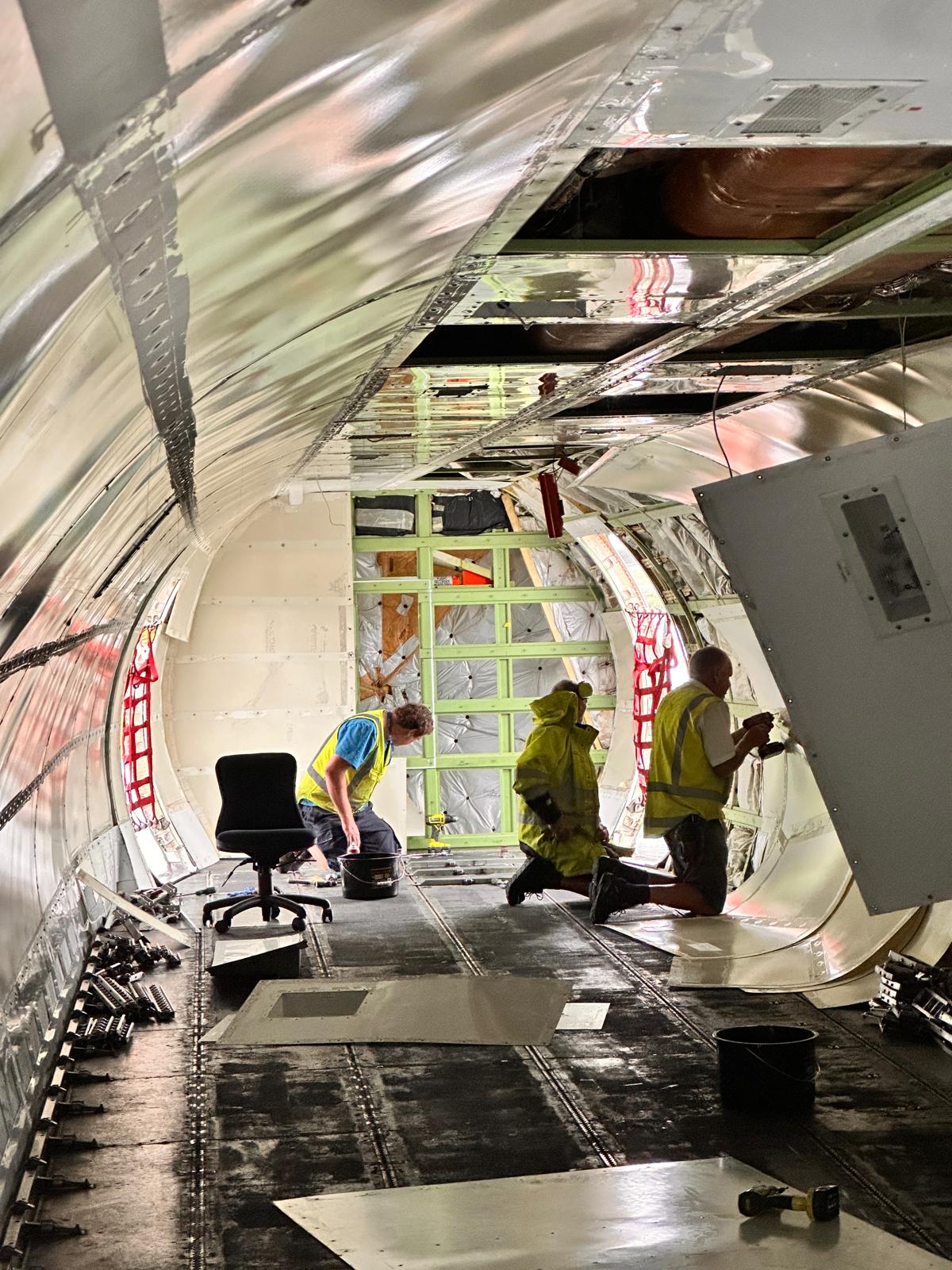 Boeing 737 airframe undergoing project maintenance and transition work in hangar