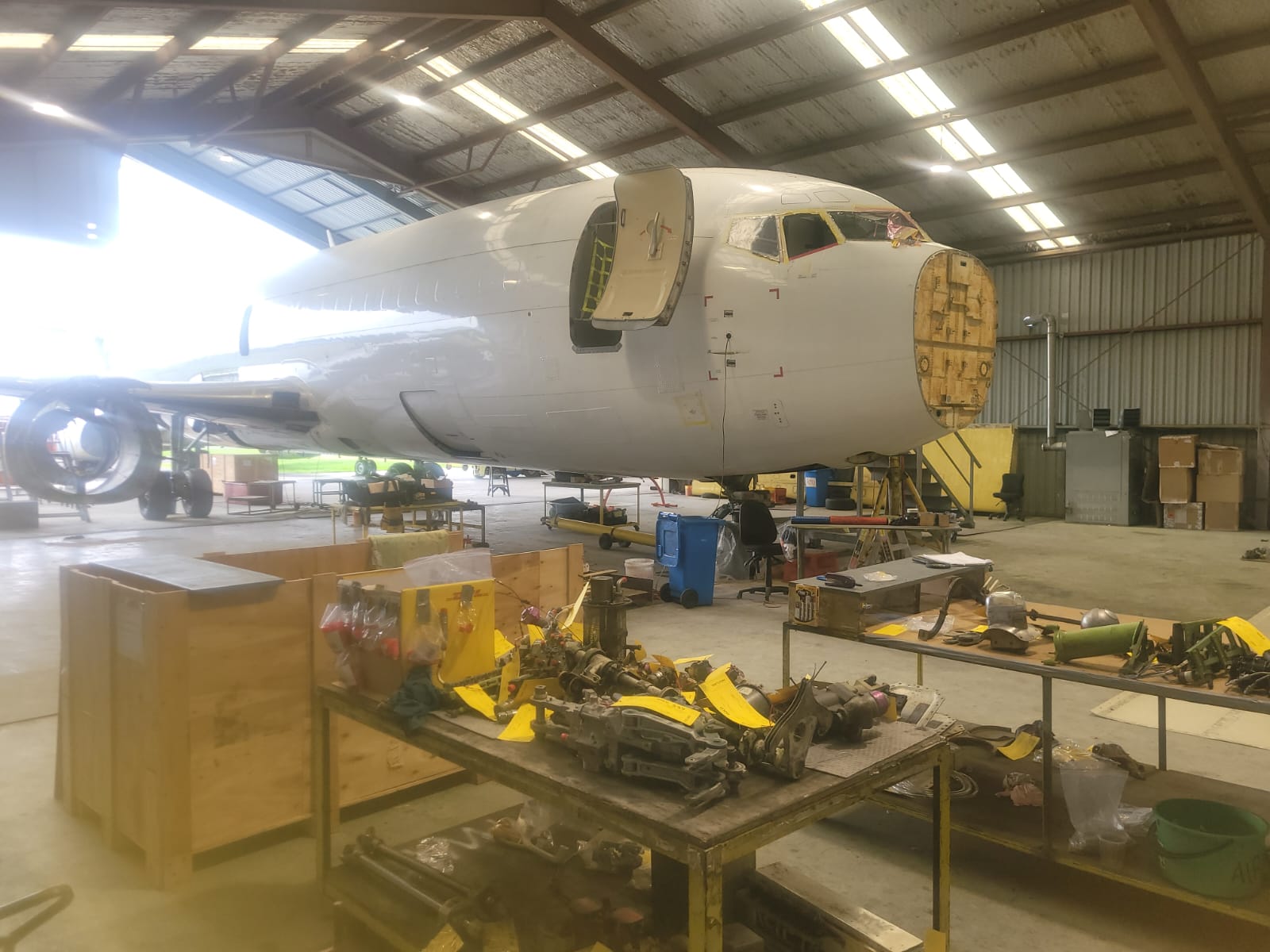 Engineering team carrying out interior aircraft technical support work